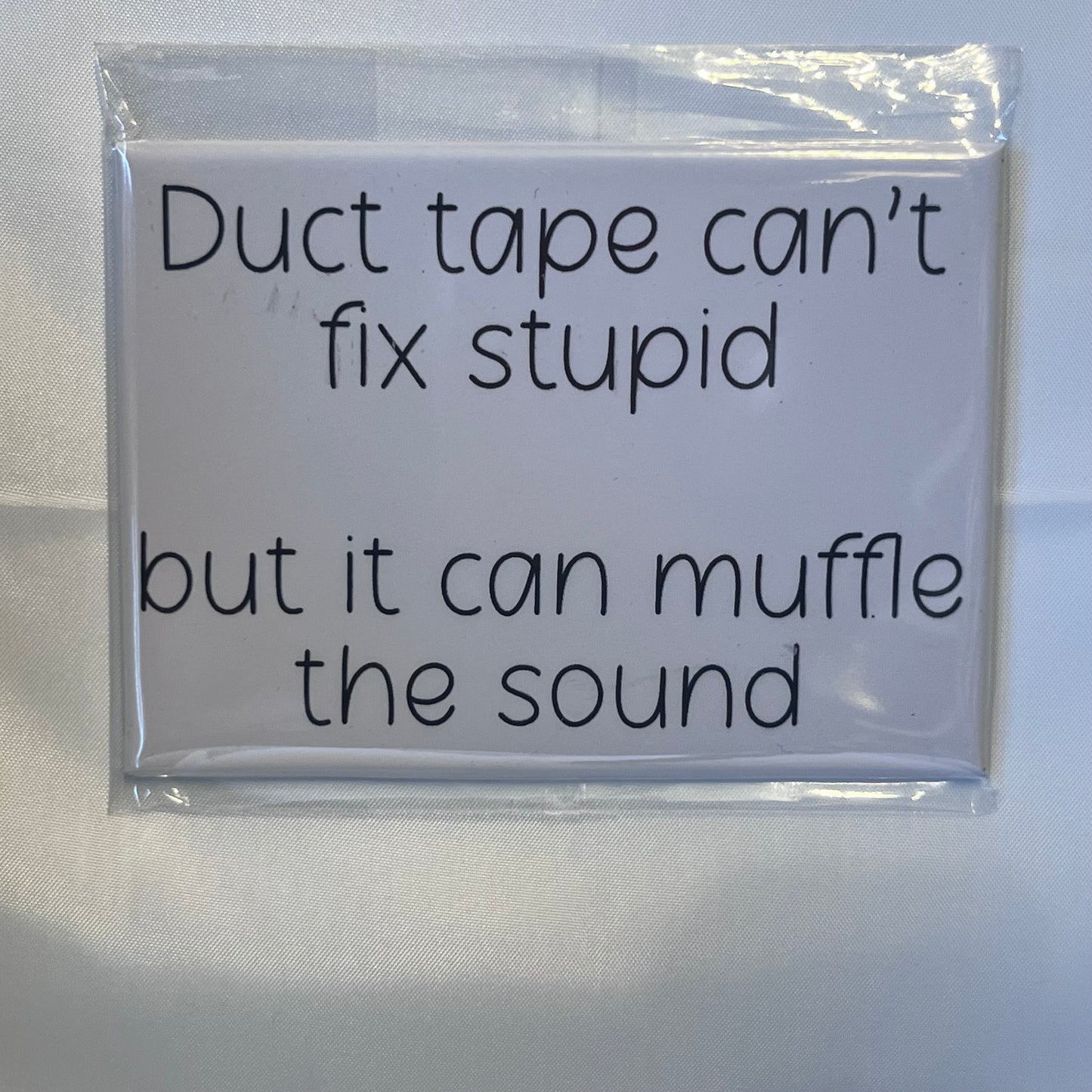 "Duct Tape Can't Fix Stupid, But It Can Muffle the Sound" Magnet – A Hilarious Must-Have!