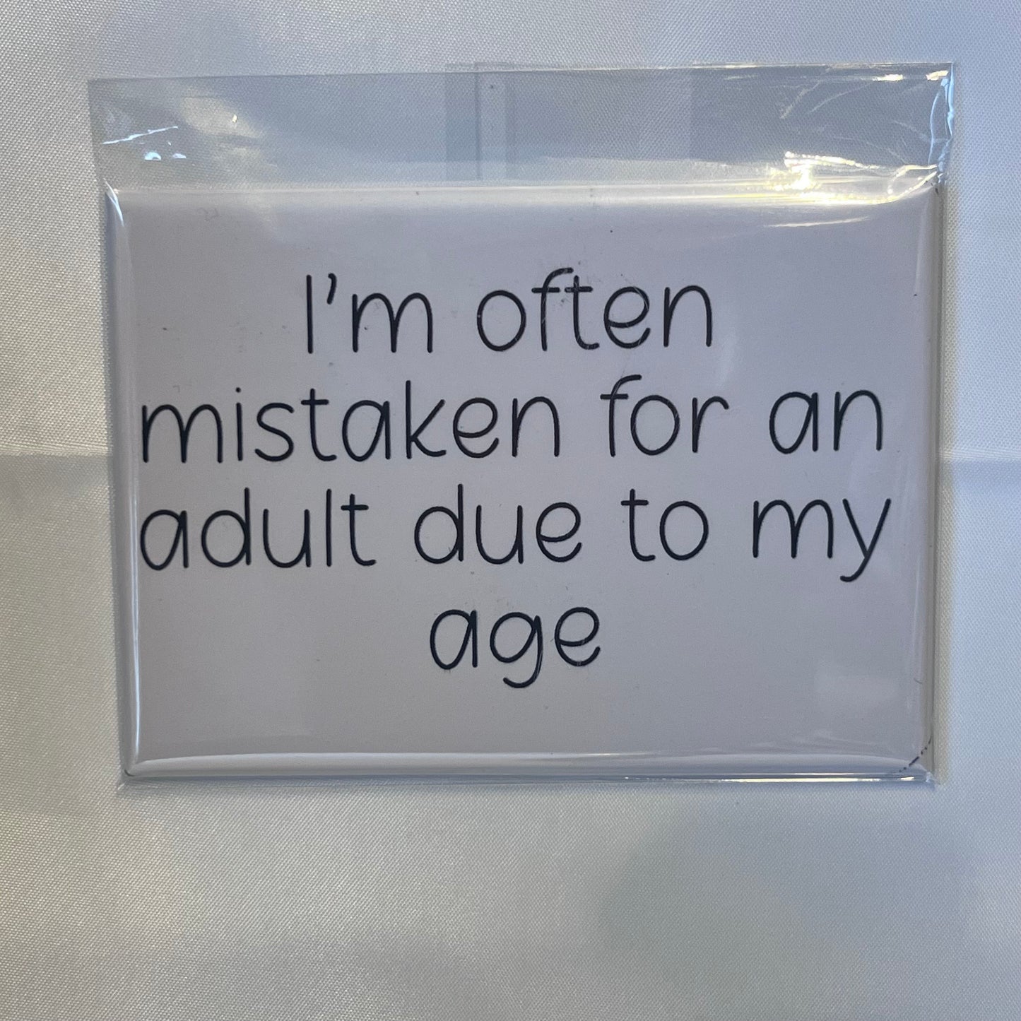 "I'm Often Mistaken for an Adult Due to My Age" Magnet – The Perfect Quirky Gift!