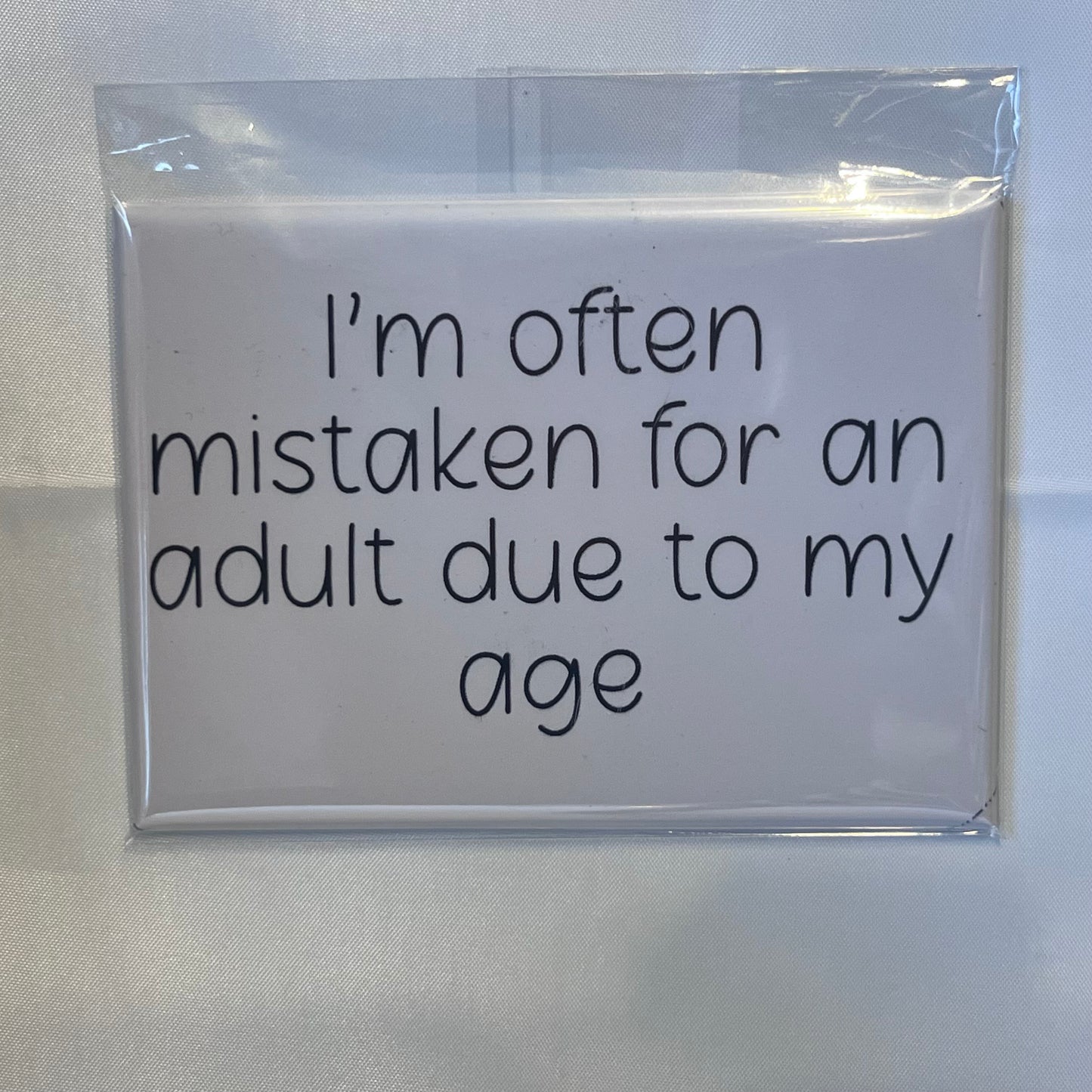 "I'm Often Mistaken for an Adult Due to My Age" Magnet – The Perfect Quirky Gift!